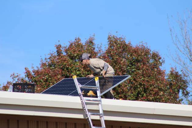 The crew of EightTwenty Solar work on installing 42 solar panels on the Earlsboro Elementary School building on Nov. 6. Principal Stacey Barton said he worked with OG&amp;E through the CLEAResult Program to make this happen. They were on a waiting list for the past five years. Countywide &amp; Sun/Natasha Dunagan