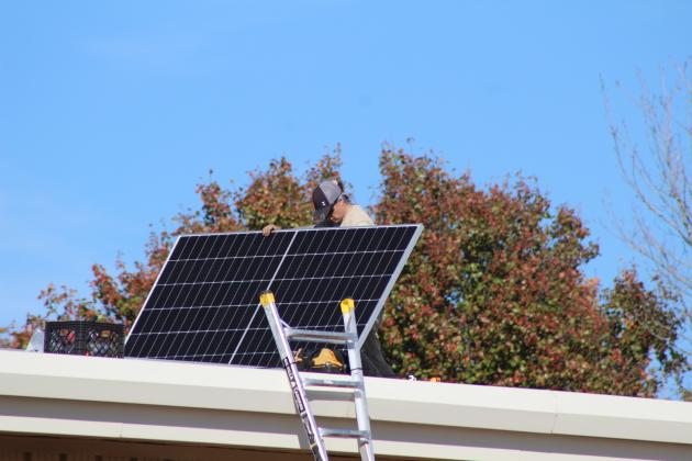 The crew of EightTwenty Solar work on installing 42 solar panels on the Earlsboro Elementary School building on Nov. 6. Principal Stacey Barton said he worked with OG&amp;E through the CLEAResult Program to make this happen. They were on a waiting list for the past five years. Countywide &amp; Sun/Natasha Dunagan