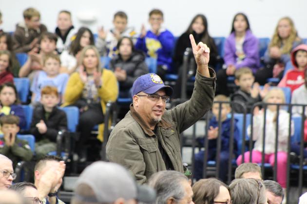 Signaling that he is the one U.S. Coast Guard veteran in attendance, Tony Little is recognized during the Bethel High School Veterans Day Program on Nov. 10 at the new gym. Countywide &amp; Sun/Natasha Dunagan
