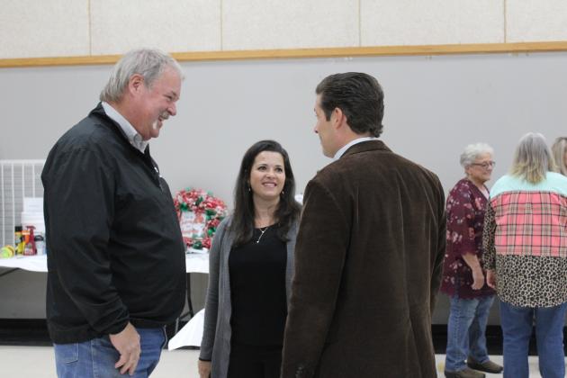 Randy Gilbert talks with Oklahoma Senator Shane and Ana Jett during the Tecumseh High School FFA Pig Roast on Nov. 17. Countywide &amp; Sun/Natasha Dunagan