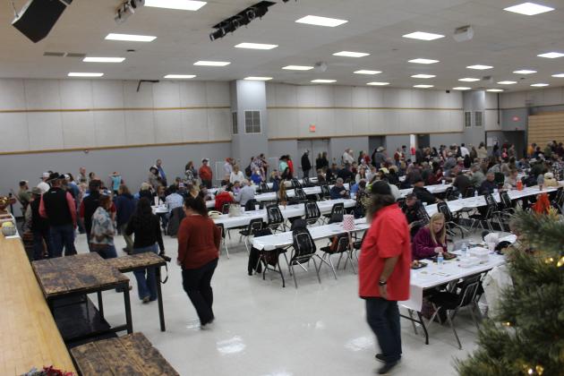 The line at the Tecumseh High School FFA Pig Roast stretched half-way around the W.P. Wood/THS Alumni Center on Nov. 17. It is estimated that there were around 300 in attendance. Countywide &amp; Sun/Natasha Dunagan