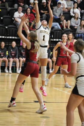 Tecumseh senior Serenity Jacoway makes a bucket in the second quarter of the first home game against Tuttle, Nov. 28. The Lady Savages lost, 26-46. The Savages also lost, 62-72. Countywide &amp; Sun/Natasha Dunagan