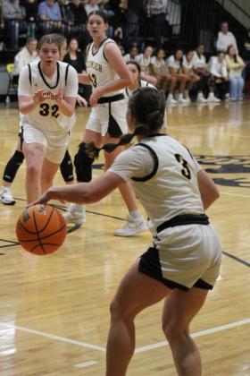 Tecumseh junior Katie Overstreet prepares to pass to senior Reagan Berry during the first home game against Tuttle, Nov. 28. Countywide &amp; Sun/Natasha Dunagan