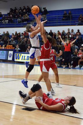 Bethel's Lexi Tucker goes up for two during the First United Basketball Classic tournament against McLoudl last Friday night.  Bethel won, and then lost to Tecumseh in the Championship game the following night.  Countywide &amp; Sun/Julie Talton