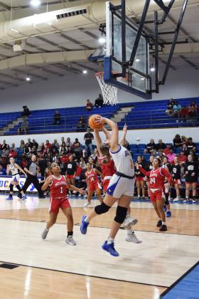Bethel's lexi Tucker bends for the basket during the First United Basketball Classic tournament against Mcloud last Friday night.  Bethel won, and then lost to Tecumseh in the Championship game the following night.  Countywide &amp; Sun/Julie Talton
