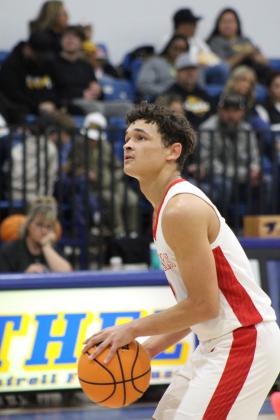 McLoud's Dorrian Matlock prepares for a free throw in the Consolation Round of the First United Basketball Classic against Tecumseh, held on Dec. 9 at Bethel High School. McLoud won, 60-39, for the third-place trophy. Countywide &amp; Sun/Natasha Dunagan
