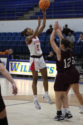McLoud's Analiese Johnson puts up a shot during the game with Blanchard at the First United Basketball Classic on Dec. 7. McLoud won that game, 50-30. Then, they lost to Bethel, 39-43, and beat Sallisaw, 41-37. Countywide &amp; Sun/Natasha Dunagan