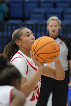 McLoud's Taycee Lewis shoots from the free throw line during the game with Blanchard at the First United Basketball Classic, held at Bethel High School on Dec. 7. McLoud won that game, 50-30. Then, they lost to Bethel, 39-43, and beat Sallisaw, 41-37. Countywide &amp; Sun/Natasha Dunagan