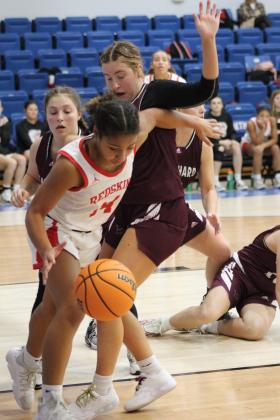 McLoud's Claire Mapira takes possession of the rebound during the game with Blanchard at the First United Basketball Classic, held at Bethel High School on Dec. 7. McLoud won that game, 50-30. Then, they lost to Bethel, 39-43, and beat Sallisaw, 41-37. Countywide &amp; Sun/Natasha Dunagan