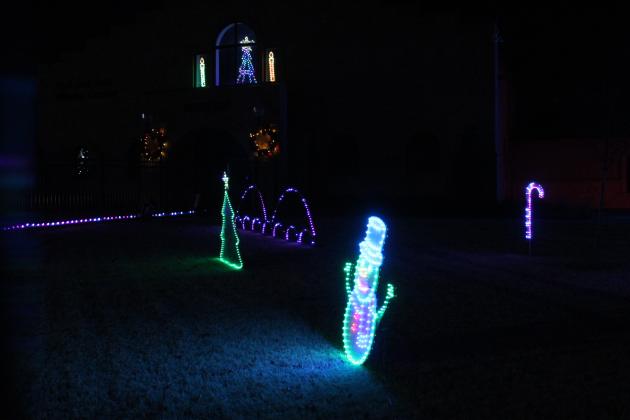 The Pottawatomie County Historical Society Light Show has moved outdoors this year, since they have installed a fence around the Paul and Ann Milburn Center in Shawnee. It features 13 Christmas songs programmed to synchronize with the light show, and it lasts about 26 minutes, said PCHS Director Ken Landry. Countywide &amp; Sun/Natasha Dunagan