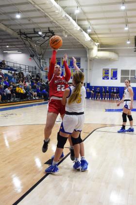 Mcloud's Abery Sowward shoots for two during the First United Basketball Classic tournament against Bethel last Friday night.  Bethel won, and then lost to Tecumseh in the Championship game the following night.  Countywide/Sun Julie Talton