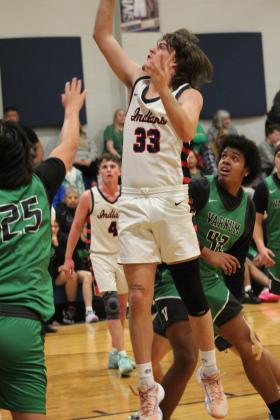 Asher's Jordyn Litson makes a basket in the first quarter of the Jan. 2 home game with Varnum. Countywide &amp; Sun/Natasha Dunagan
