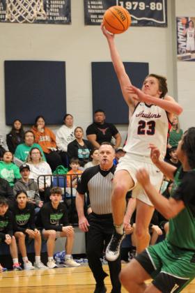 After stealing the ball, Asher's Mikey VanSchuyver goes for a layup and is fouled in the Jan. 2 home game with Varnum. Countywide &amp; Sun/Natasha Dunagan