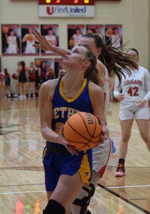 Bethel's Josie Megehee puts two on the board against North Rock Creek last Friday night.  The Cougars won the battle 51-50 Countywide &amp; Sun/Julie Talton