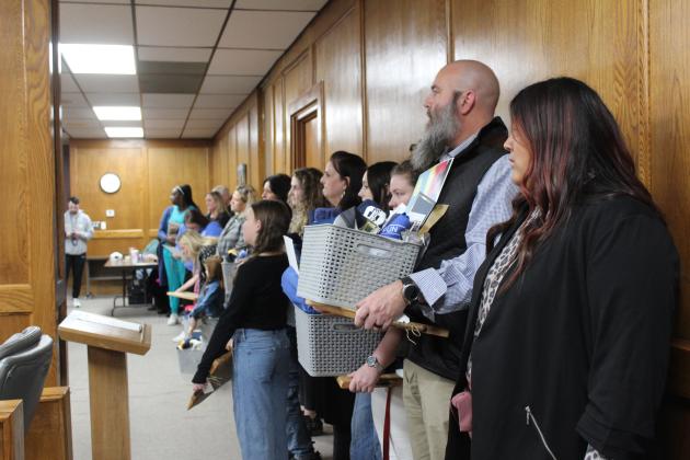 Ready with gift baskets for the school board.