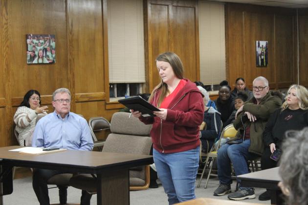 Cyndi Berger speaks during public comments.