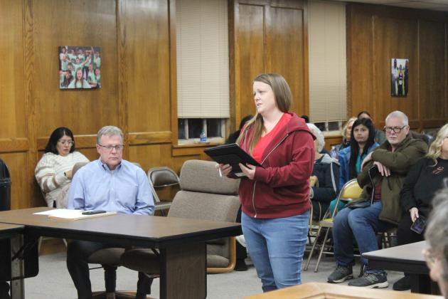 Cyndi Berger speaks during public comments.