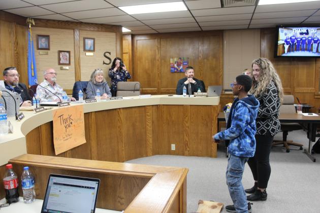 Horace Mann Principal Christie Lovelady and fifth-grader Arlandus Brannon introduce themselves.