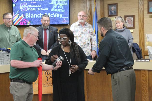 Shawnee Bus Monitor Blanch McVey accepts gifts, as the Star of the Month.