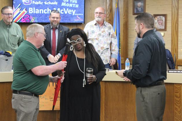 Shawnee Bus Monitor Blanch McVey accepts gifts, as the Star of the Month.