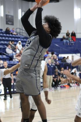 Shawnee sophomore Aidon Siqueiros tries for a shot and draws a foul in the Jan. 18 Lowe's/FireLake Arena Shawnee Invitational game with Broken Arrow. The Shawnee Wolves lost that game, 21-60; won the Jan. 19 game with Tahlequah, 57-49; and fell to El Reno, Jan. 20, 37-52. Countywide &amp; Sun/Natasha Dunagan