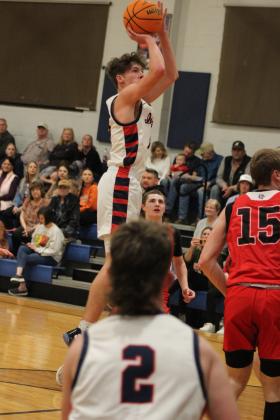 Asher's Mikey VanSchuyver aims and sinks a jump shot during the Senior Night home game with  Stratford, Feb. 2. The Indians lost 49-51, but they will go on to play in District 3 competition at 7:30 pm, Feb. 10, at home. Countywide &amp; Sun/Natasha Dunagan