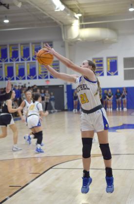 Josie Meghee jumps for the pass in the game against Tecumseh on Feb, 2nd.  Bethel lost 43-46 in the intense battle.  Countywide &amp; Sun/Julie Talton