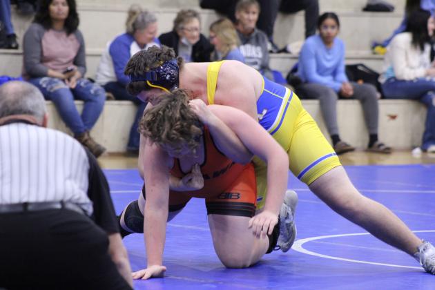 Bethel's Jasper Hayes tries a move on Konawa's Taylor Nowlin during the wrestling meet on Jan. 25. Bethel also faced Prague for the Wrestling Homecoming and Senior Night meet. Countywide &amp; Sun/Natasha Dunagan