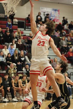 After stealing the ball, Dale senior Deken Jones puts it through the hoop during the Class 2A District game with Mounds, Feb. 17. The Pirates stomped Mounds, 90-37, and will play in regional competition at Dale today (Feb. 22) at 7:30 pm.  Countywide &amp; Sun/Natasha Dunagan