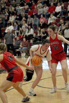 Dale senior Karsen Griggs drives toward the basket before scoring in the final regular season home game, with Vanoss.