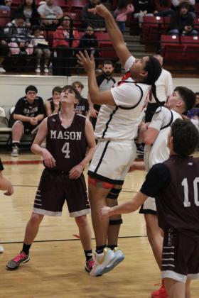 Earlsboro junior Quentin Lena gets the rebound and sinks the shot in the first quarter of the Senior Night home game with Mason, Feb. 3. The Wildcats won, 76-46. Their District 8 game will be in Cement, Feb. 9, at 7:30. Countywide &amp; Sun/Natasha Dunagan