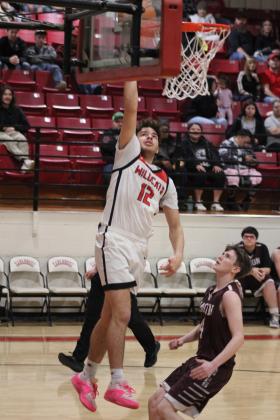 Earlsboro senior James Smith sinks a layup in the first quarter of the Senior Night home game with Mason, Feb. 3. The Wildcats won, 76-46. Their District 8 game will be in Cement, Feb. 9, at 7:30. Countywide &amp; Sun/Natasha Dunagan