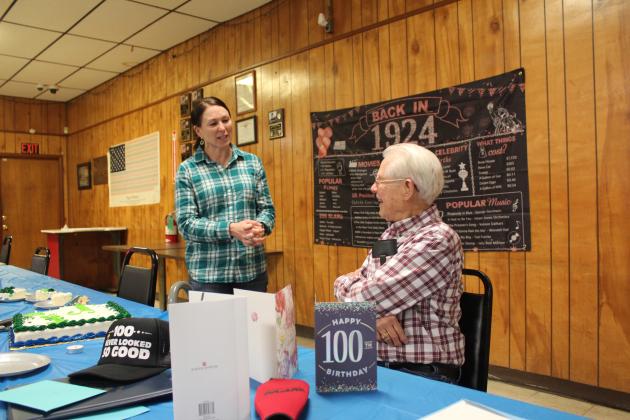 Army veteran and State House of Representatives Candidate Kerri Keck wishes Noah "Sonny" Hines a happy 100th birthday and speaks with him during a birthday party in his honor at the Veterans of Foreign Wars Post 1317, Feb. 5. Countywide &amp; Sun/Natasha Dunagan