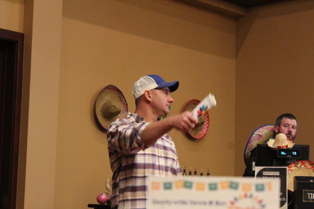 Nathan Elliott spots a bid.
