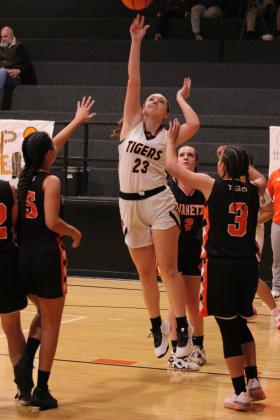 Maud’s Kadie Jencik shoots for two in the third quarter of the Jan. 26 homecoming game. The game was called in the third quarter due to a fight between the Tigers, and Maud won, 44-22.