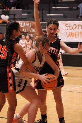 Maud's Jaycee Pack tries to make her shot with two Wanette players, Lynda Vasquez and Lily Gregory, working defense in the third quarter of the Jan. 26 homecoming game. Countywide &amp; Sun/Natasha Dunagan