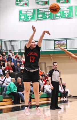 North Rock Creek's Olivia McRay shoots for three. The Lady Cougars came up short against the Lady Longhorns Tuesday night.  The girls fell 38-52. They will take on Bishop McGuiness tonight (Thursday). They will host Bristow in District on Feb. 17th. Photo courtesy of Gowin Photography
