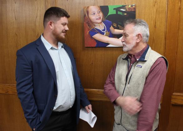 Tristan Wyatt speaks with former Assistant Superintendent of Business Brent Houston. Wyatt was approved at the Feb. 5 Shawnee Board of Education meeting as the new Director of Finance. Countywide &amp; Sun/Natasha Dunagan