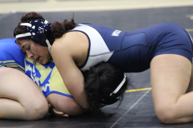 Shawnee's Zakaria McClain wears down her Noble opponent, Kaleem Arkins, in the dual on Jan. 25, held at the PAAC. Countywide &amp; Sun/Natasha Dunagan