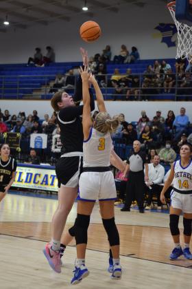 Tecumseh's Reagan Berry shoots for two to close the gap in the game against Bethel on Feb. 2nd.  The Savages fought back for the win 46-43. Countywide &amp; Sun/Julie Talton