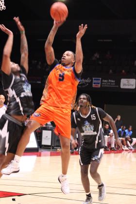 Potawatomi Fire power forward Ruston Hayward adds two points to the board with a jumper in the fourth quarter of the home game with the Wichita Sky Kings on March 15. Hayward scored 20 points in the game, according to www.potawatomifire.com. The Fire won, 148-125. Countywide &amp; Sun/Natasha Dunagan