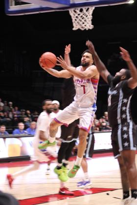 Potawatomi Fire point guard Deshawn Munson aims at the bucket.