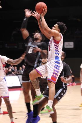 Potawatomi Fire point guard Deshawn Munson is fouled as he goes up for a layup during the March 23 home game with the Texas 7ers. The 2023 TBL National Champs continued their winning streak of six games with a final score of 141-119. Countywide &amp; Sun/Natasha Dunagan