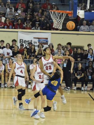 Alexis Williams gets fouled as she tries for the basket in the season ending game against No. 1 ranked Washington of the opening game of the 3A Championship at the State Fair Arena.  Bethel suffered a heartbreaking loss 54-27 as both teams emptied their benches.  Countywide &amp; Sun/Julie Talton