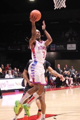 Potawatomi Fire small forward Ricky Artis Jr. aims for the bucket during their first game of the third season on March 1. The Basketball League National Champions beat the Enid Outlaws at FireLake Arena, 136-91. Countywide &amp; Sun/Natasha Dunagan