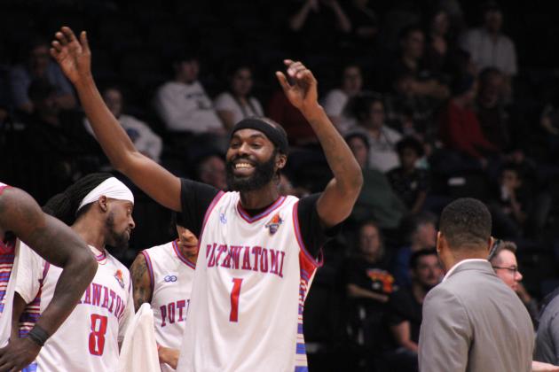 Potawatomi Fire shooting guard Myron McGowan keeps the beat as the crowd sings "Sweet Caroline" by Neil Diamond during their first game of the third season on March 1. Countywide &amp; Sun/Natasha Dunagan