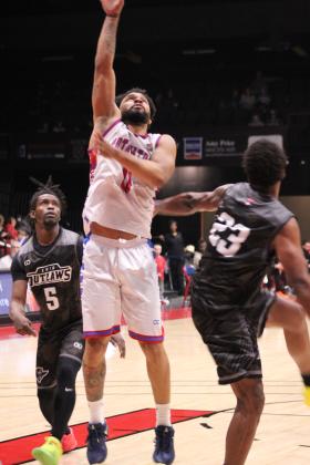 Potawatomi Fire point guard Deshawn Munson makes a basket during their first game of the third season on March 1. The Basketball League National Champions beat the Enid Outlaws at FireLake Arena, 136-91. Countywide &amp; Sun/Natasha Dunagan