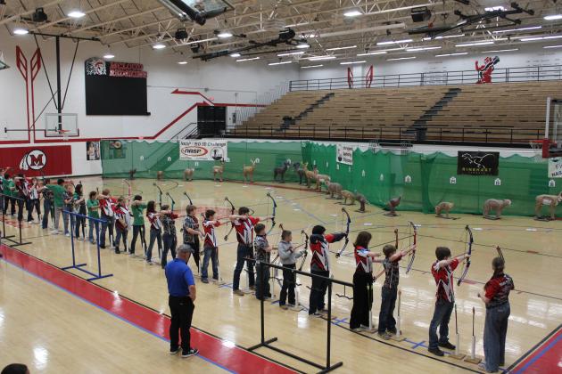 Archery students from McLoud Middle School and High School and other schools line up to shoot at 3D targets during the 2024 Oklahoma State NASP®/IBO 3D Challenge, held at McLoud on March 2. There were 26 schools and 413 students in fourth grade through senior competing that day. This is the second time for McLoud to host a 3D archery tournament. Countywide &amp; Sun/Natasha Dunagan