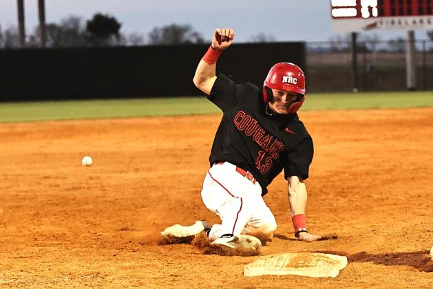 North Rock Creek's Drake Clemmons beats the throw at third in the game Thursday, Mar. 14, against Prague. Photo courtesy of Gowin Photography