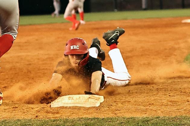 North Rock Creek's Owin Payne is safe at third in action Thursday, Mar. 14 against Prague. NRC won 13-0. Photo courtesy of Gowin Photography